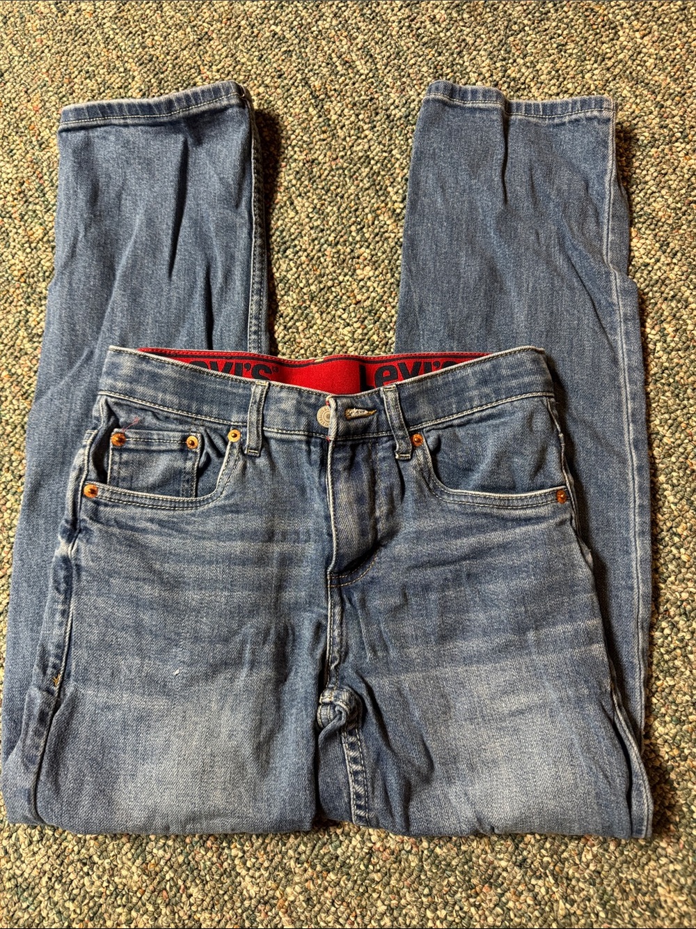 Levi's Straight Fit Light Blue Denim Jeans with Red Waistband Accent
